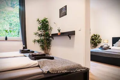 Ein Bett oder Betten in einem Zimmer der Unterkunft LiRo Apartments Lohscheidt Mülheim