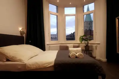 Ein Bett oder Betten in einem Zimmer der Unterkunft Diamera Appartments Zentral und Modern