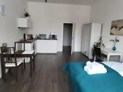 Ein Bett oder Betten in einem Zimmer der Unterkunft Diamera Appartments Zentral und Modern