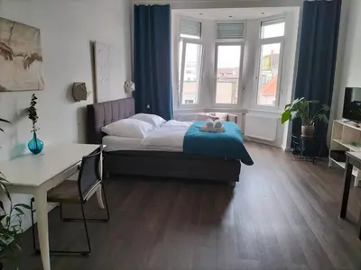 Ein Bett oder Betten in einem Zimmer der Unterkunft Diamera Appartments Zentral und Modern