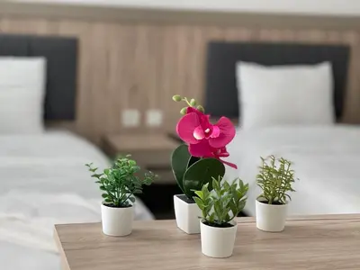 Ein Bett oder Betten in einem Zimmer der Unterkunft Weseler Wirtshaus Appartements