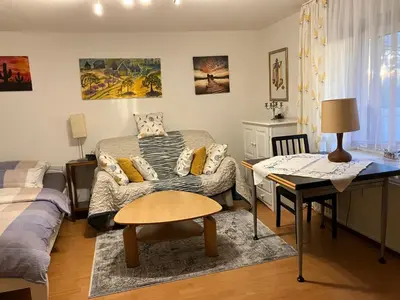 Ein Bett oder Betten in einem Zimmer der Unterkunft Ferienwohnung im Grünen EG mit Terrasse