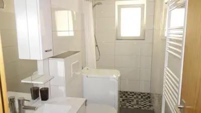 Ein Badezimmer in der Unterkunft Ferienwohnung im Grünen EG mit Terrasse
