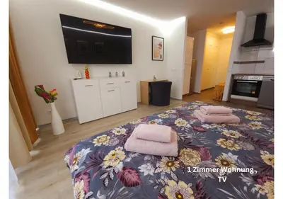 Ein Bett oder Betten in einem Zimmer der Unterkunft 3-2-1 Zimmer Wohnungen in Mülheim an der Ruhr