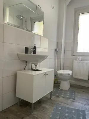 Ein Badezimmer in der Unterkunft estrella24 LIVING ROOMS London