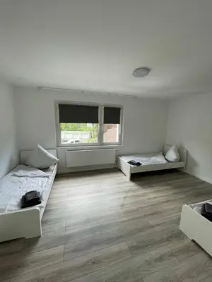 Ein Bett oder Betten in einem Zimmer der Unterkunft estrella24 LIVING ROOMS London