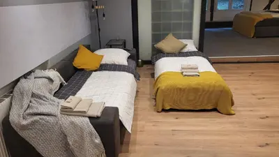 Ein Bett oder Betten in einem Zimmer der Unterkunft Modern Loft near City I free Parking I WiFi