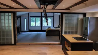 TV/Unterhaltungsangebot in der Unterkunft Modern Loft near City I free Parking I WiFi