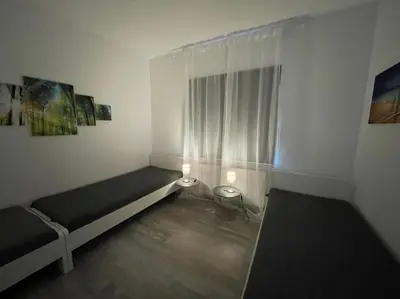 Ein Bett oder Betten in einem Zimmer der Unterkunft Heimathafen Wanne