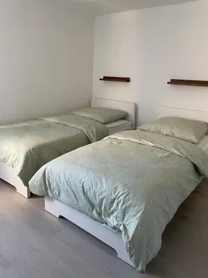 Ein Bett oder Betten in einem Zimmer der Unterkunft SANO - Hagen - Am Predigerstuhl