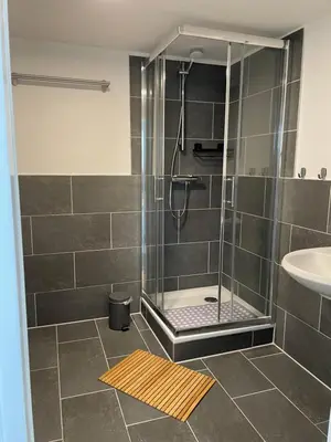 Ein Badezimmer in der Unterkunft SANO - Hagen - Am Predigerstuhl