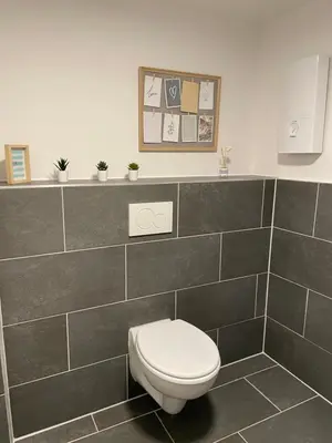Ein Badezimmer in der Unterkunft SANO - Hagen - Am Predigerstuhl