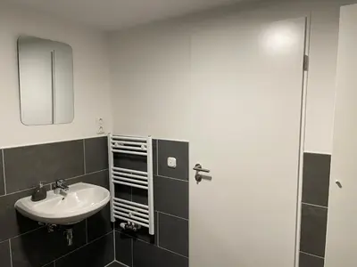 Ein Badezimmer in der Unterkunft SANO - Hagen - Am Predigerstuhl