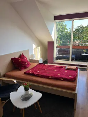 Ein Bett oder Betten in einem Zimmer der Unterkunft Gemütliches Apartment in Essen