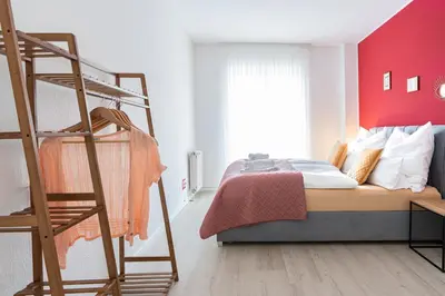 Ein Bett oder Betten in einem Zimmer der Unterkunft Golden Design Apartment, Zentral, Familie und Business, 1000 Mbit