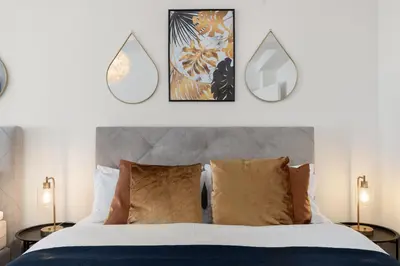 Ein Bett oder Betten in einem Zimmer der Unterkunft Maracoon - Loft Apartments Essen City Center
