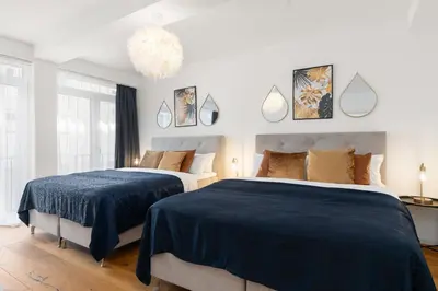 Ein Bett oder Betten in einem Zimmer der Unterkunft Maracoon - Loft Apartments Essen City Center