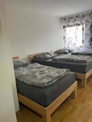 Ein Bett oder Betten in einem Zimmer der Unterkunft Ferienwohnung in der Kulturhauptstadt