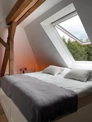 Ein Bett oder Betten in einem Zimmer der Unterkunft DESIGN-Studio CHURCH 46