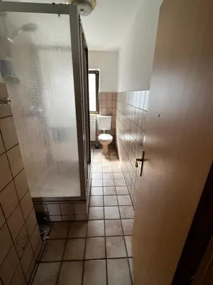 Ein Badezimmer in der Unterkunft Gemütliches Zimmer mit großer Terrasse Nähe Messe, Flughafen & PSD Dome