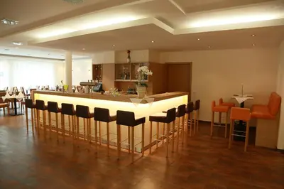 Ein Restaurant oder anderes Speiselokal in der Unterkunft Ardey Hotel