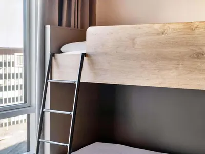 Ein Bett oder Betten in einem Zimmer der Unterkunft B&B Hotel Bochum-City