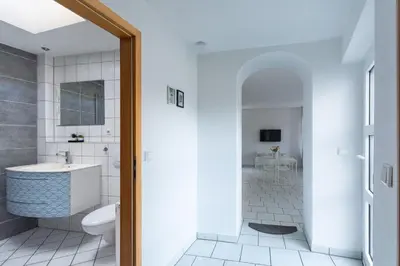 Ein Badezimmer in der Unterkunft T&K Apartments - 1-3 Zimmer Apartments - Essen