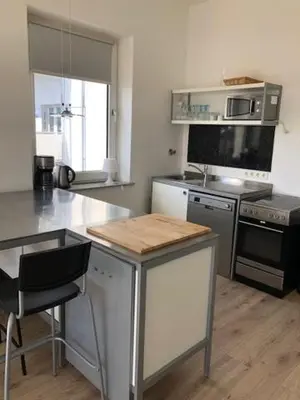 Küche/Küchenzeile in der Unterkunft studio b - Sunny City Business Apartment with roof-top terrace for 2-4 guests