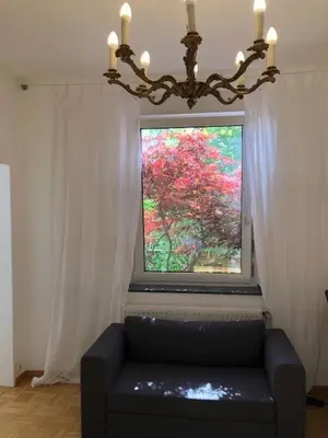 Ein Sitzbereich in der Unterkunft studio b - Sunny City Business Apartment with roof-top terrace for 2-4 guests