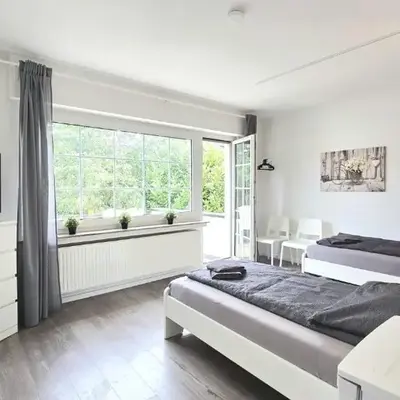 Modern 6-Bedroom Apartment with Rooftop Terrace