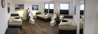 Ein Bett oder Betten in einem Zimmer der Unterkunft VerwöhnWohnungDeluxe
