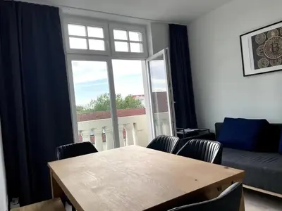 Ein Sitzbereich in der Unterkunft JayBnB - Gaming Apartment PS5 65 Zoll 4K TV Wohnung mit Balkon