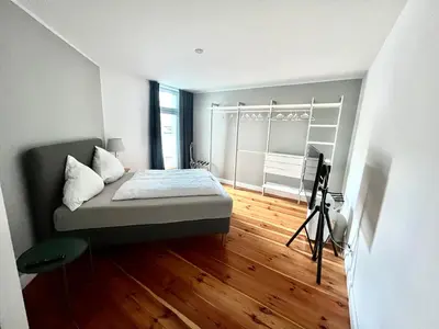 Ein Bett oder Betten in einem Zimmer der Unterkunft Vibehome Düsseldorf - Stresemannstraße