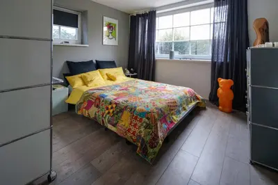 Ein Bett oder Betten in einem Zimmer der Unterkunft Apartment Mini-Loft am Schloss