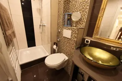 Ein Badezimmer in der Unterkunft Golden Apartments