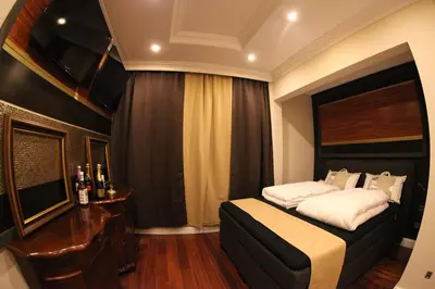 Ein Bett oder Betten in einem Zimmer der Unterkunft Golden Apartments
