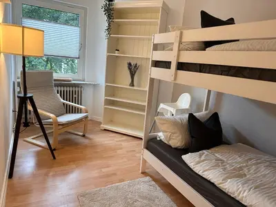 Ein Bett oder Betten in einem Zimmer der Unterkunft Wohnung in Wuppertal Elberfeld