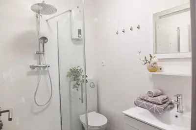 Ein Badezimmer in der Unterkunft T&K Apartments near Messe Fair Trade Düsseldorf und Airport 1B