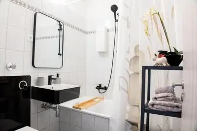 Ein Badezimmer in der Unterkunft T&K Apartments near Messe Fair Trade Düsseldorf und Airport 2A