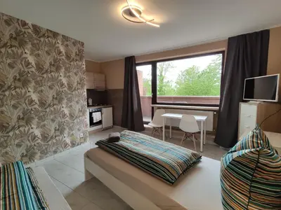 Ein Bett oder Betten in einem Zimmer der Unterkunft HOME at FRIENDS - City - Zu Hause bei Freunden