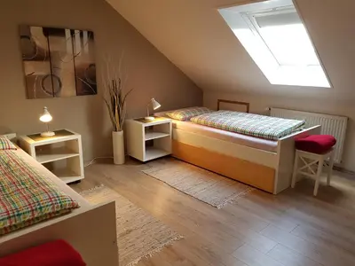 Ein Bett oder Betten in einem Zimmer der Unterkunft Haus Homann-Schneider, Apartment Stefan
