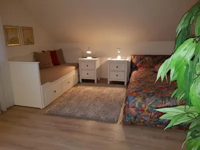 Ein Sitzbereich in der Unterkunft Haus Homann-Schneider, Apartment Stefan