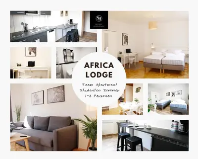 Ein Sitzbereich in der Unterkunft SH Team Lodges 4 Apartments für max 19 Personen l Monteure l Messe l Business