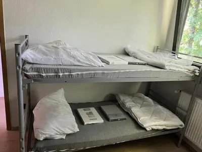 Ein Bett oder Betten in einem Zimmer der Unterkunft Schone Monteure Wohnung in Duisburg Meiderich 47137