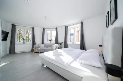 Ein Bett oder Betten in einem Zimmer der Unterkunft Favorite Stays - Suite And More - 10 Min zur Messe