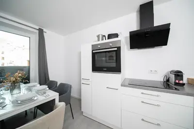 Küche/Küchenzeile in der Unterkunft Favorite Stays - Suite And More - 10 Min zur Messe