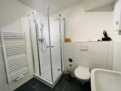 Ein Badezimmer in der Unterkunft Favorite Stays - Suite And More - 10 Min zur Messe