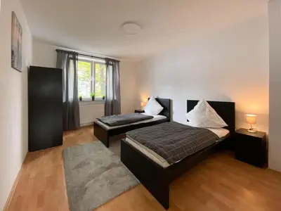 Ein Bett oder Betten in einem Zimmer der Unterkunft City Appartement