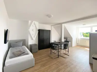Ein Sitzbereich in der Unterkunft City Appartement