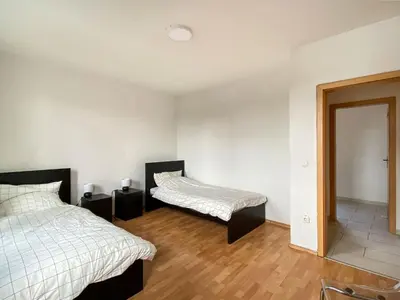 Ein Bett oder Betten in einem Zimmer der Unterkunft City Appartement